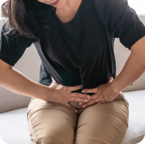 Abdominal pain in woman with stomachache illness from menstruation cramps